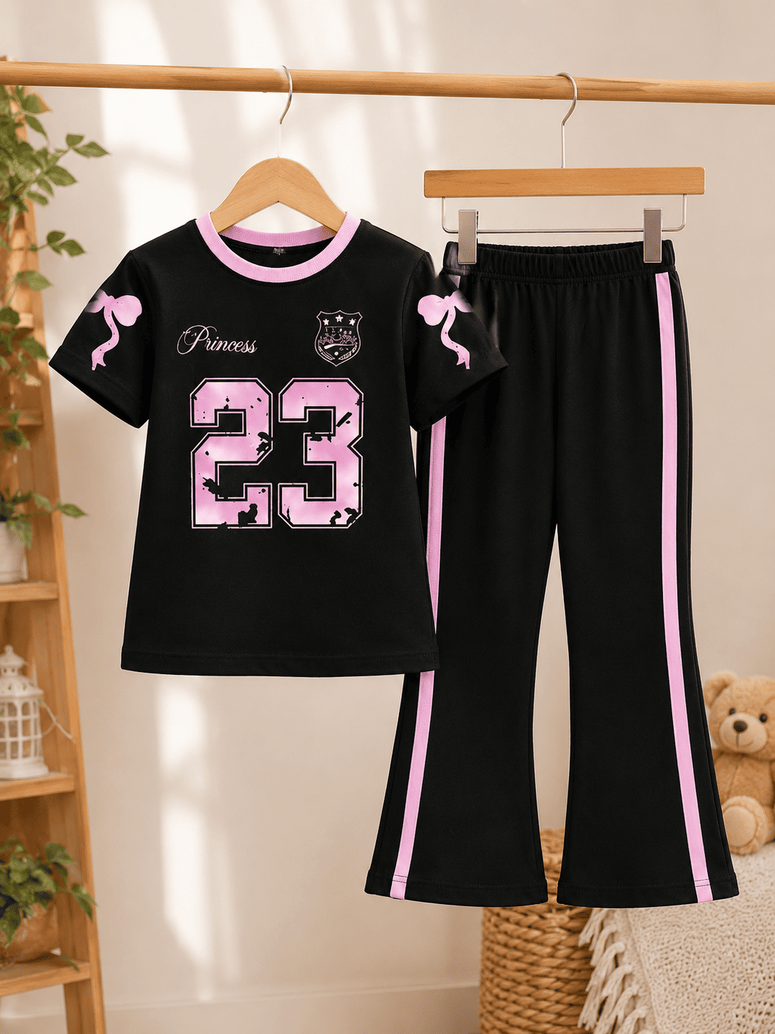 Girls' printed top and pants set for ages 3 to 12 from Ory Moon, featuring soft fabric and colorful design.