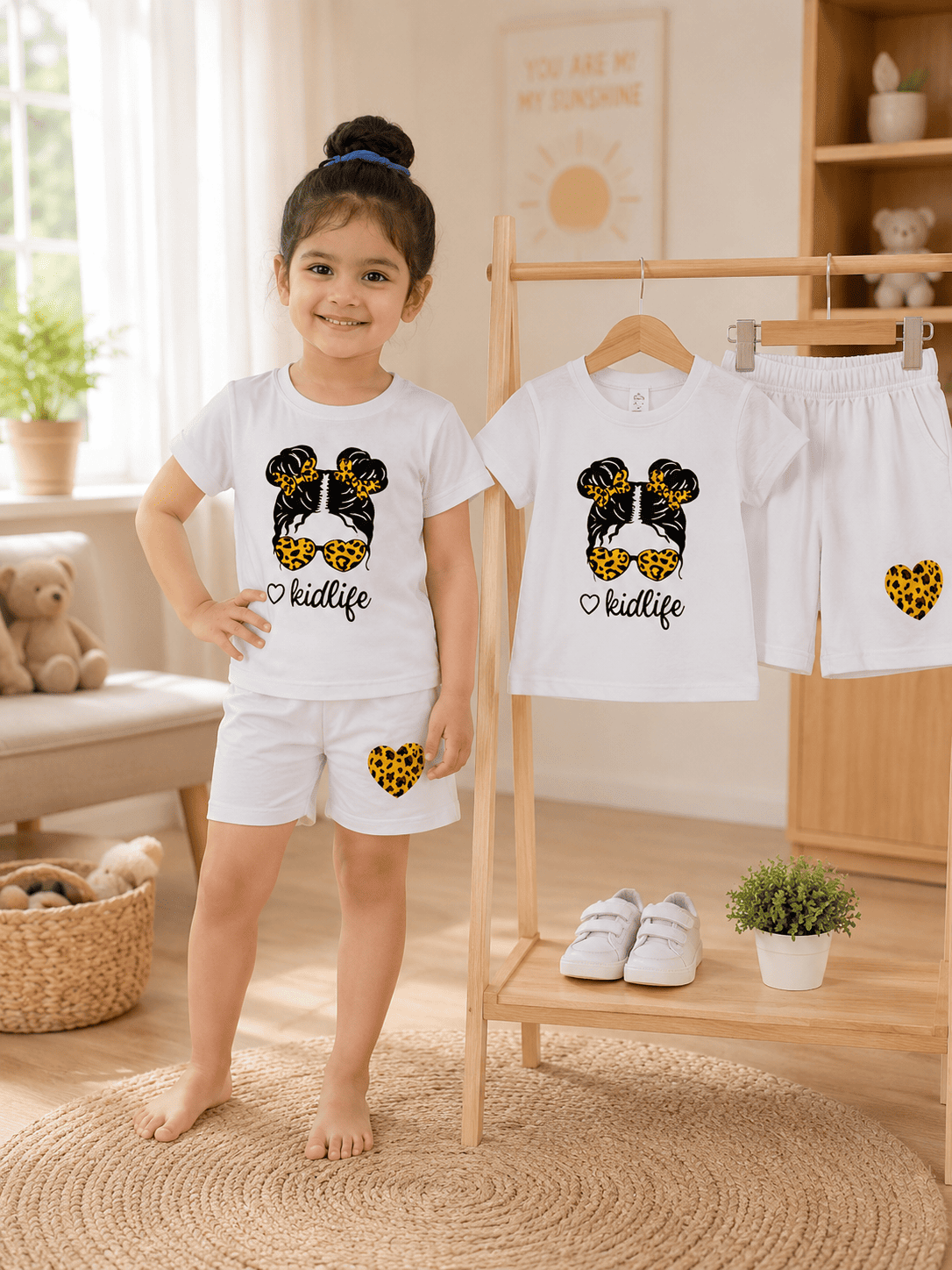 Kids girls' stylish T-shirt and shorts set by Ory Moon, featuring colorful patterns and comfortable fit for ages 6 months to 6 years.
